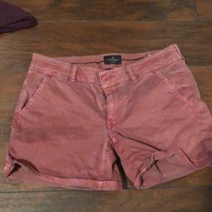 3 black shorts and one purple